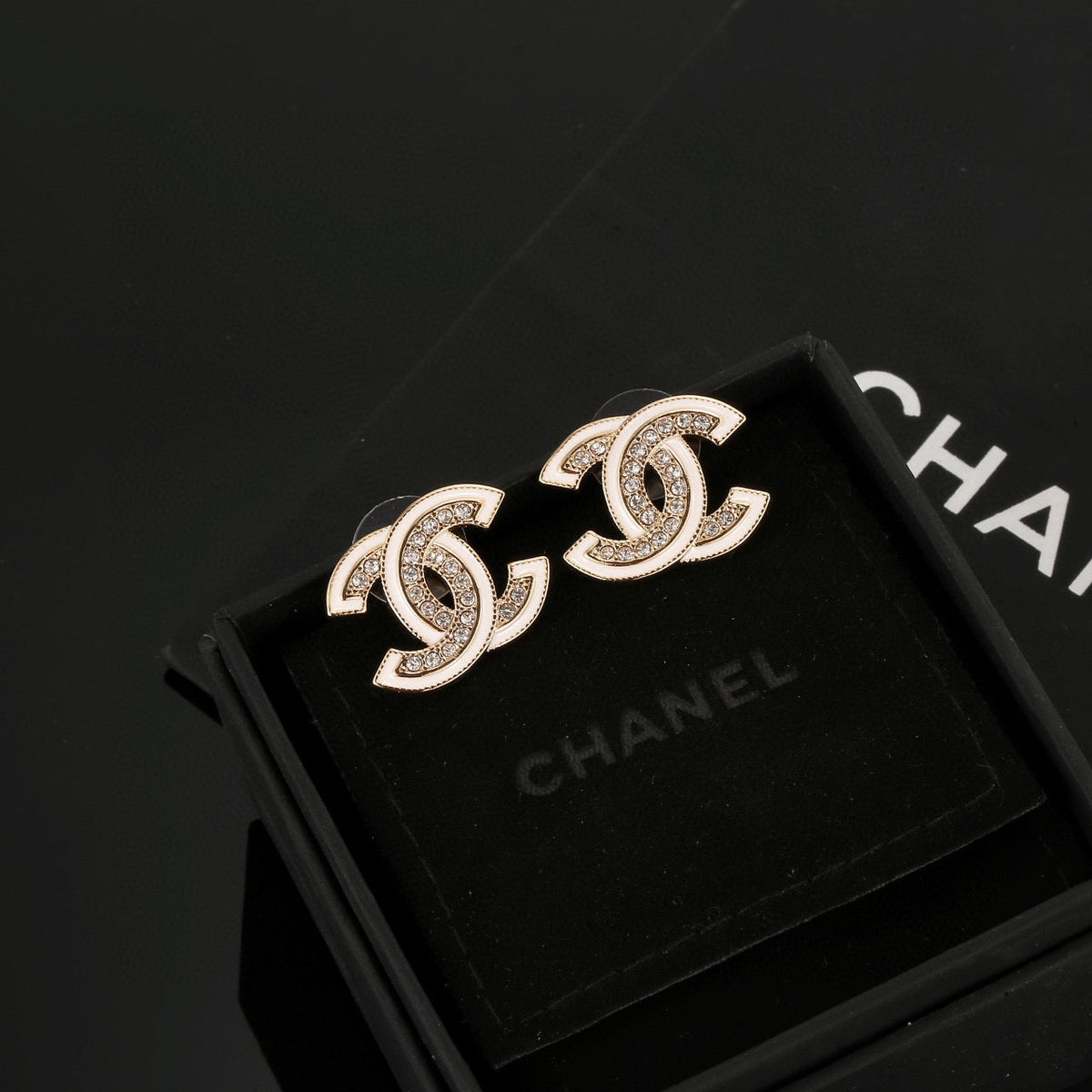 Martin Graham stud earrings in polished metal-tone – main product view