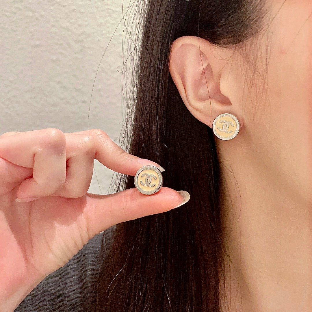 Martin Graham stud earrings in polished metal-tone – main product view