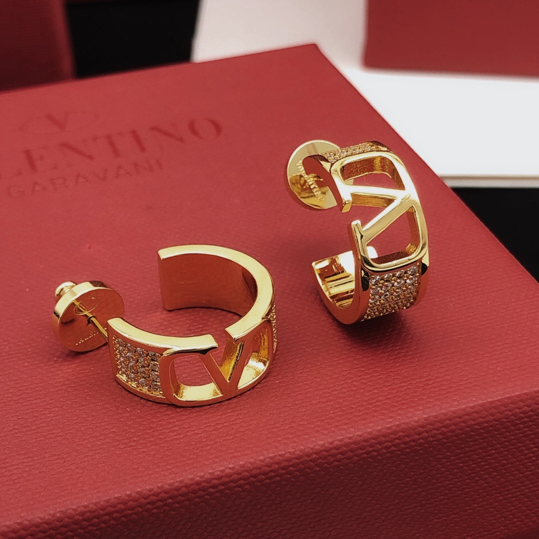 Martin Graham drop earrings in polished metal-tone – main product view
