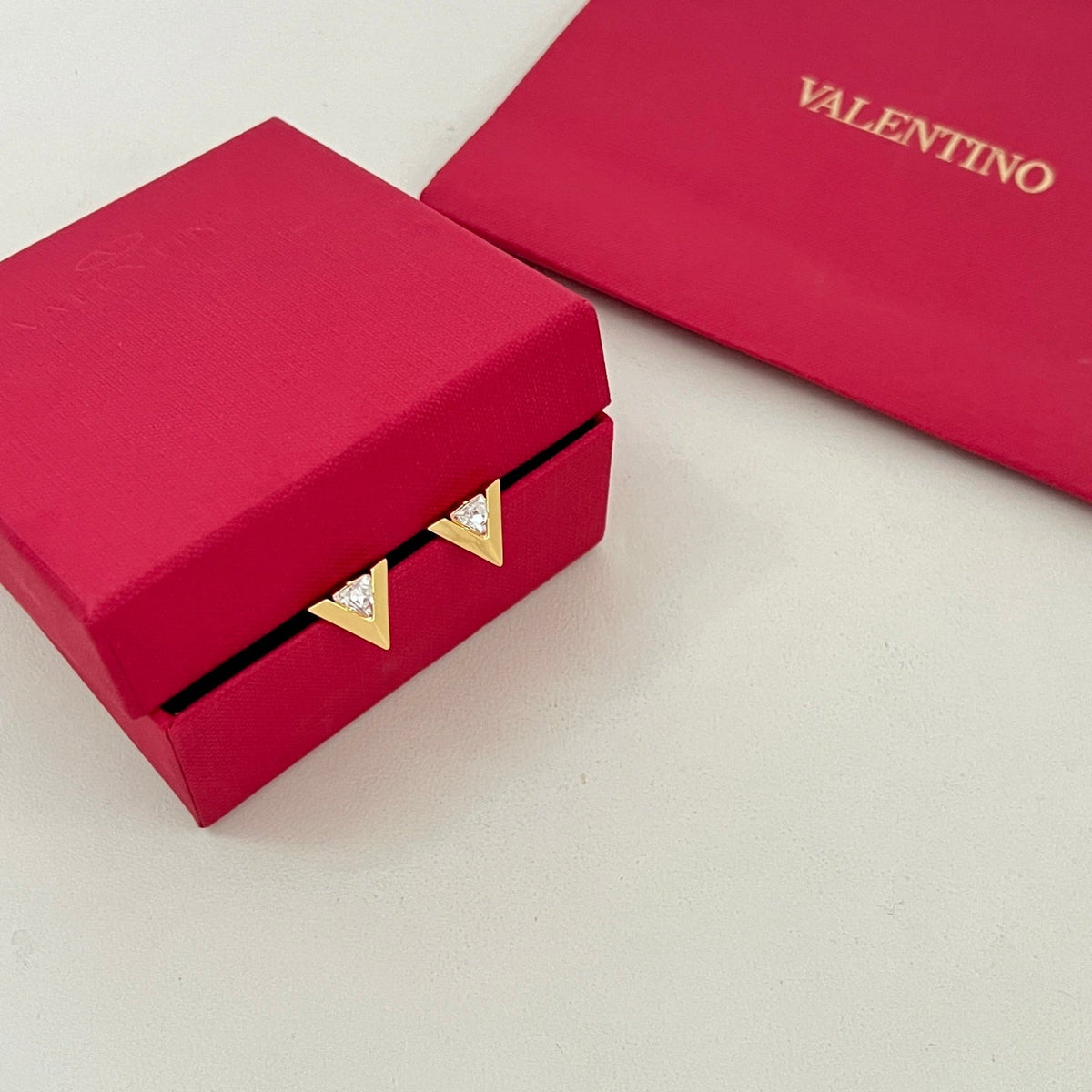 Martin Graham stud earrings in polished metal-tone – main product view