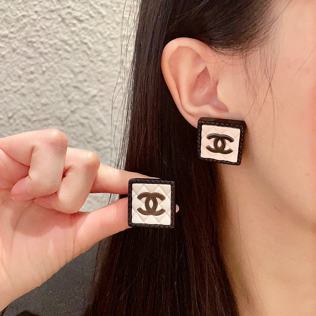 Martin Graham stud earrings in polished metal-tone – main product view