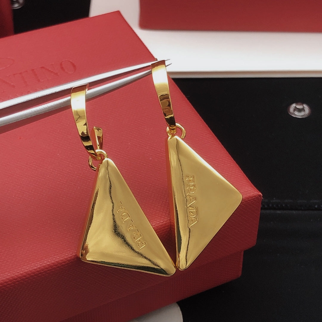 Martin Graham drop earrings in polished metal-tone – main product view