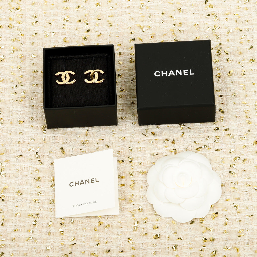 Martin Graham stud earrings in polished metal-tone – main product view
