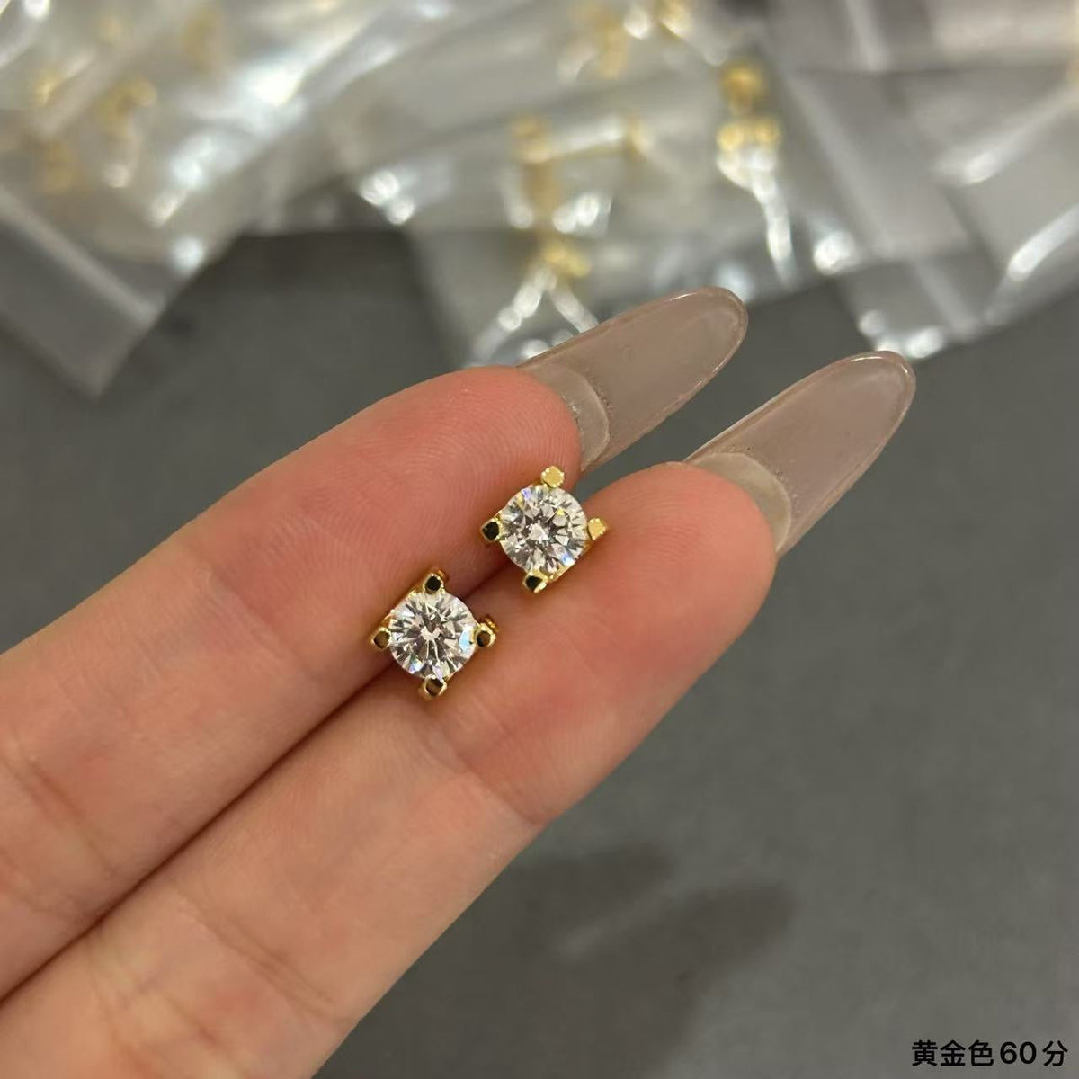 Martin Graham stud earrings in polished metal-tone – main product view