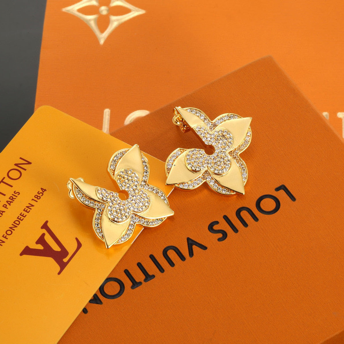Martin Graham stud earrings in polished metal-tone – main product view