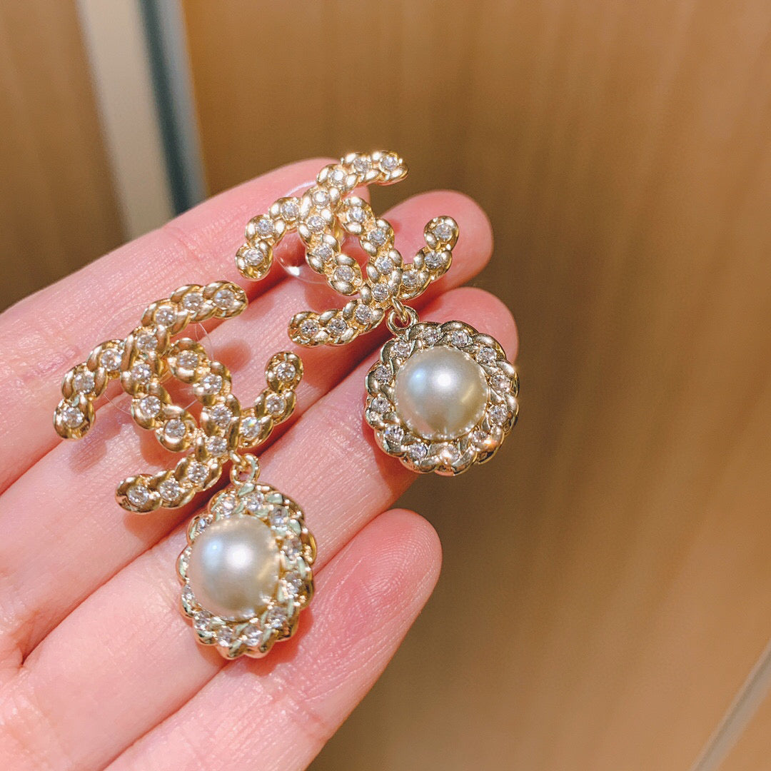 Martin Graham stud earrings in polished metal-tone – main product view