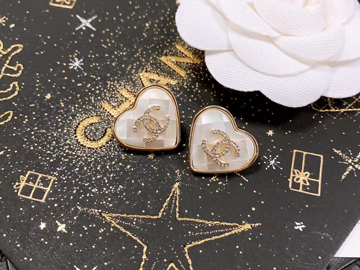 Martin Graham stud earrings in polished metal-tone – main product view