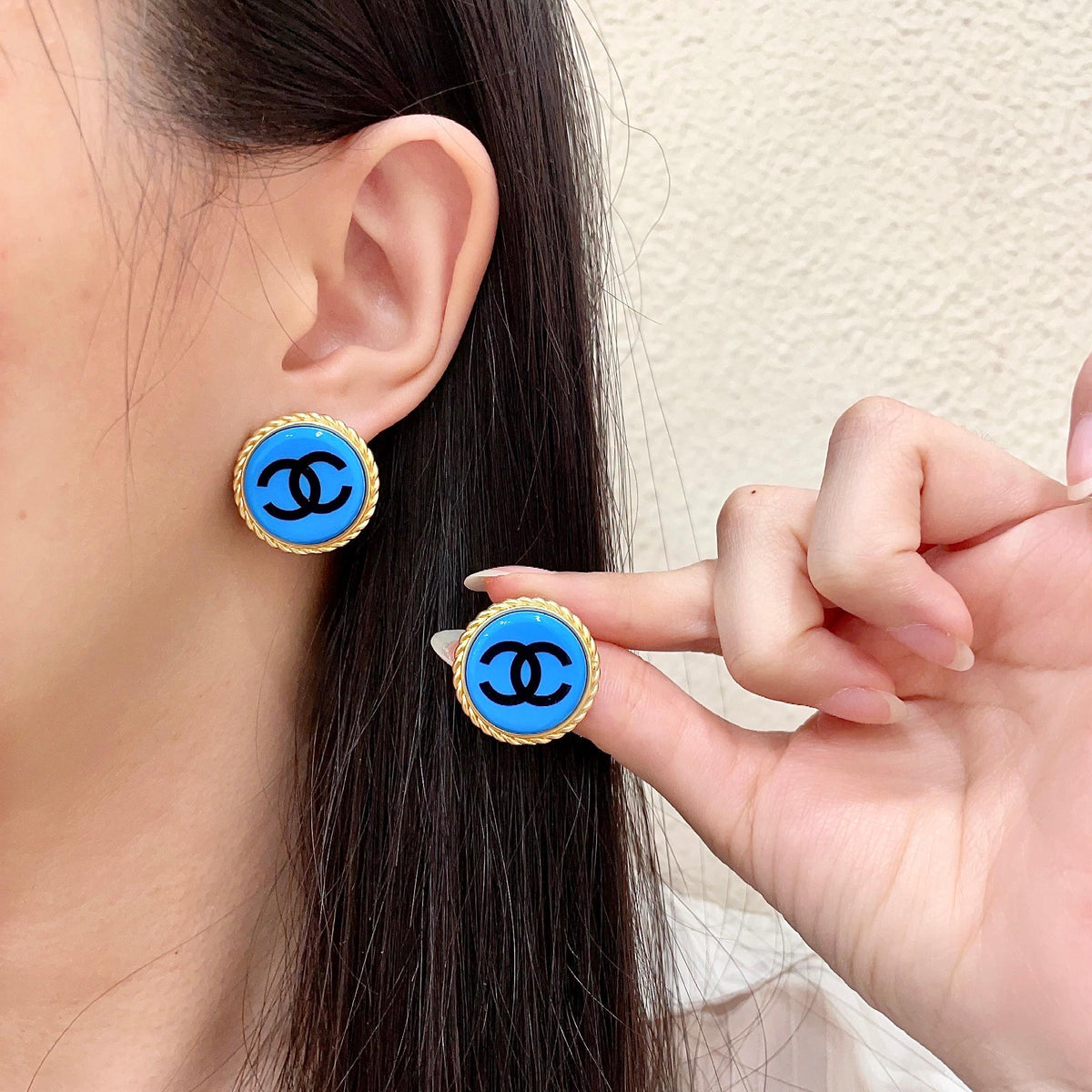 Martin Graham stud earrings in polished metal-tone – main product view