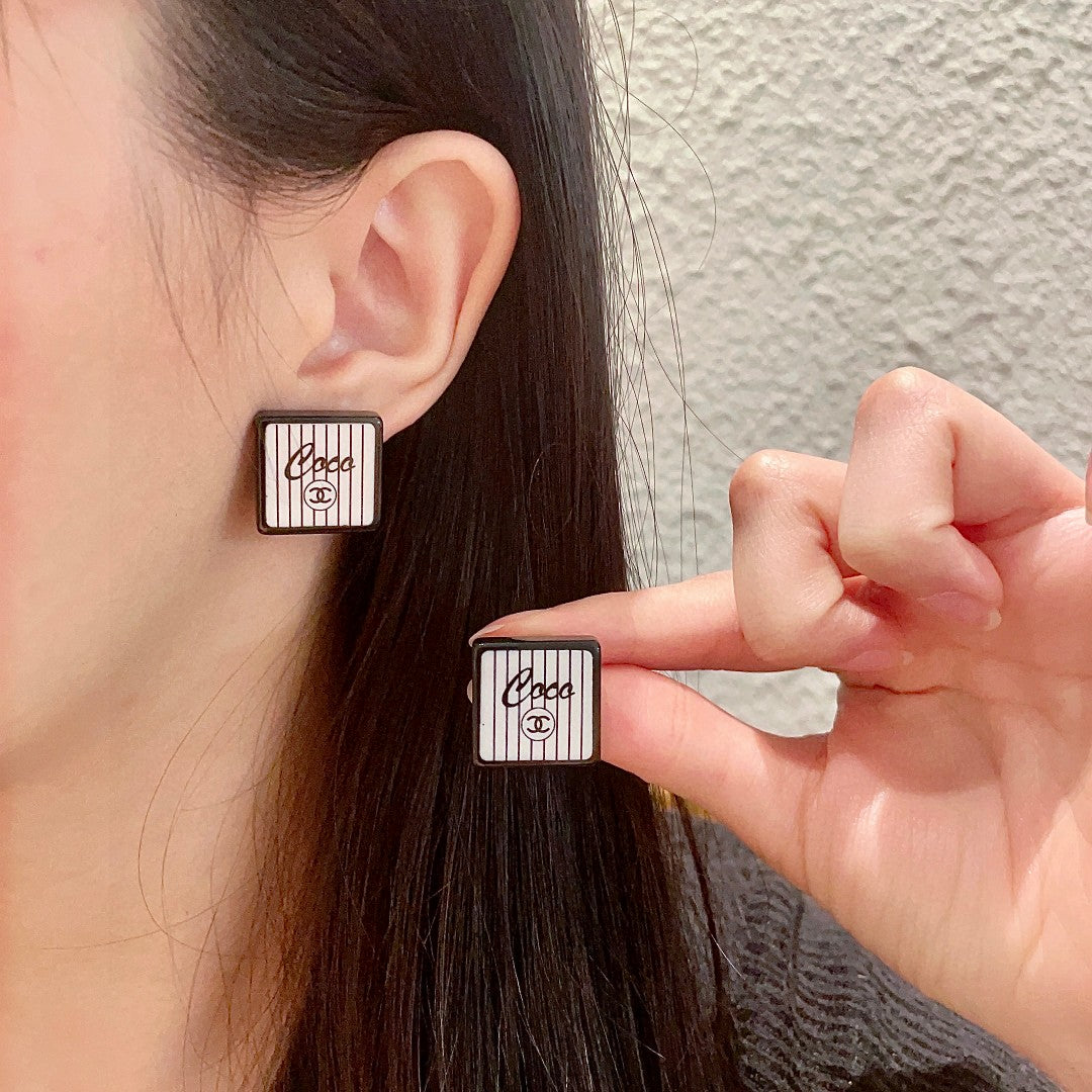 Martin Graham stud earrings in polished metal-tone – main product view