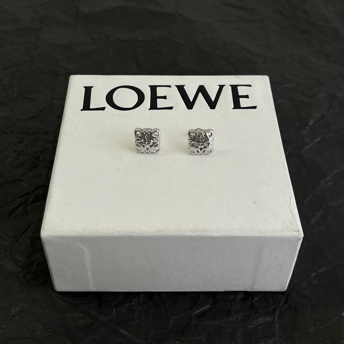 Martin Graham stud earrings in polished metal-tone – main product view