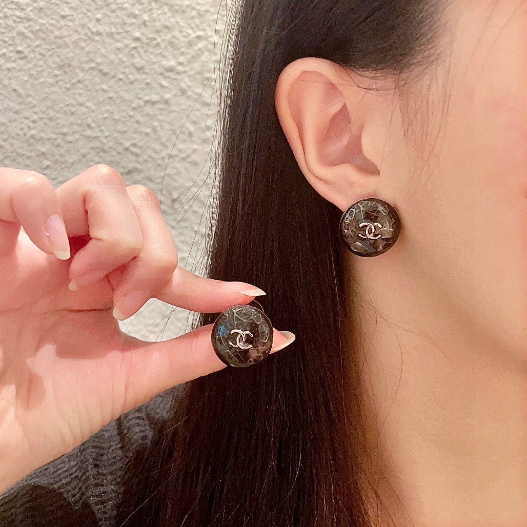 Martin Graham stud earrings in polished metal-tone – main product view