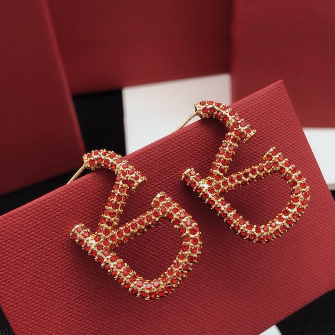 Martin Graham stud earrings in polished metal-tone – main product view