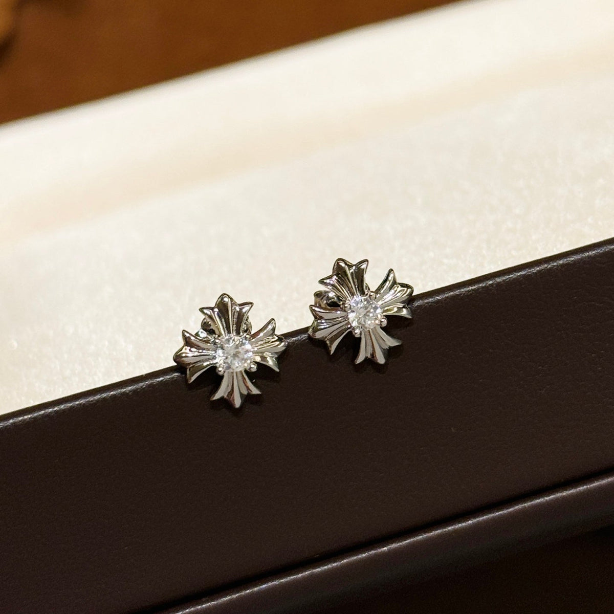 Martin Graham stud earrings in polished metal-tone – main product view
