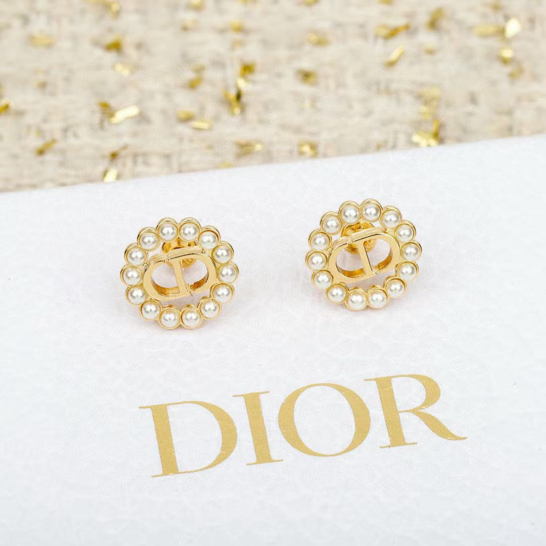 Martin Graham stud earrings in polished metal-tone – main product view