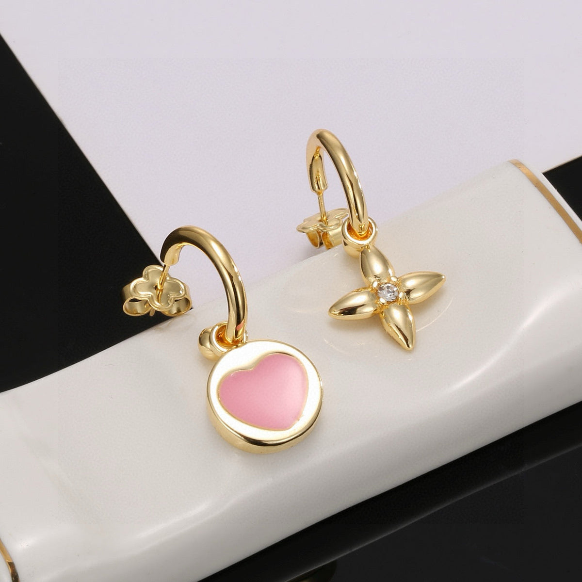 Martin Graham stud earrings in polished metal-tone – main product view