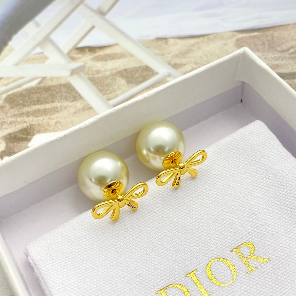 Martin Graham stud earrings in polished metal-tone – main product view