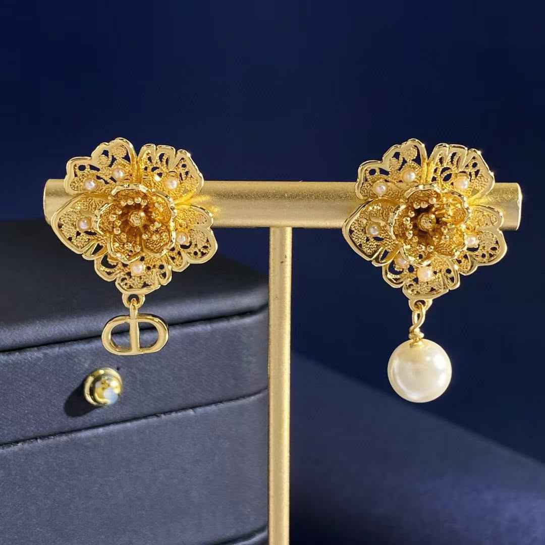 Martin Graham stud earrings in polished metal-tone – main product view