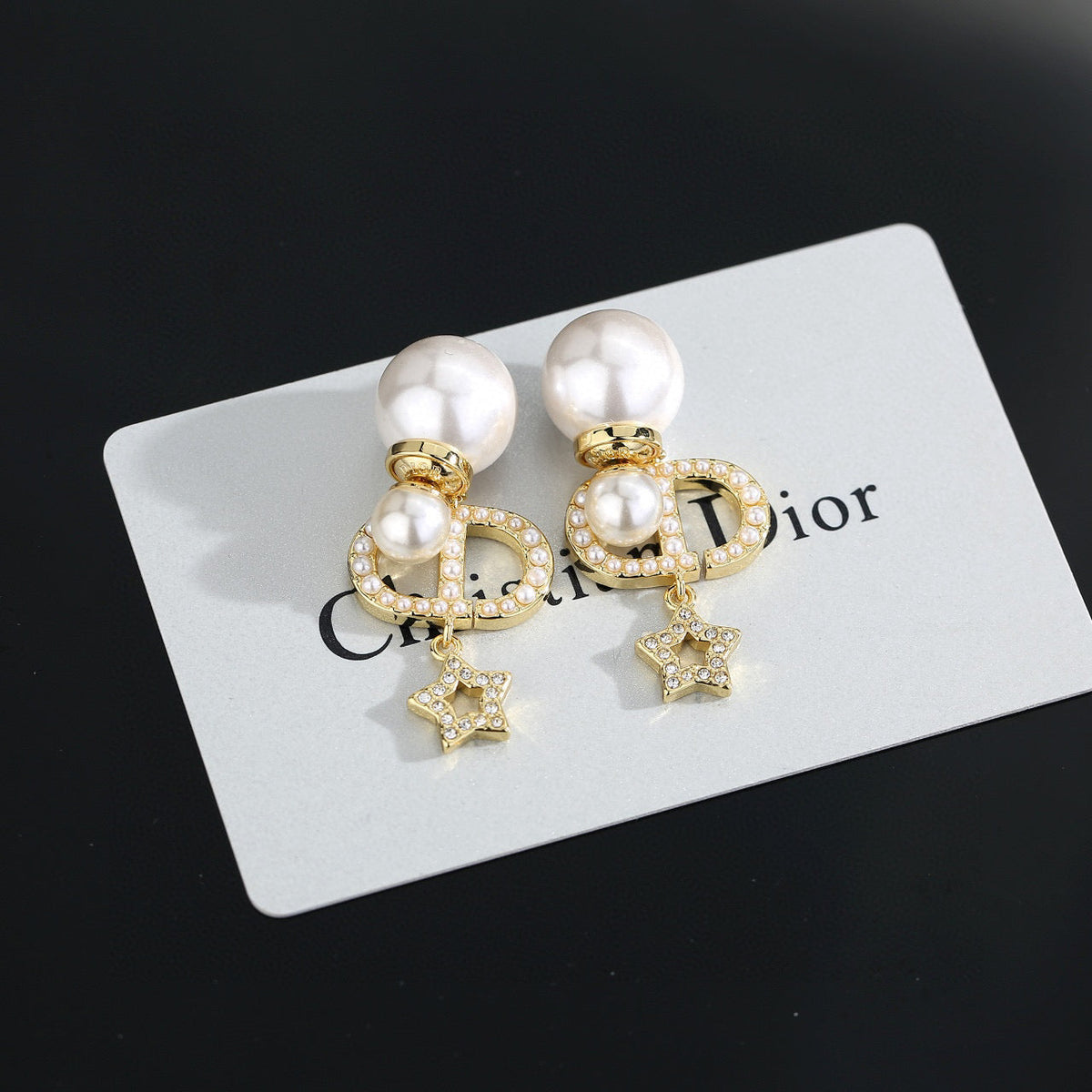 Martin Graham stud earrings in polished metal-tone – main product view