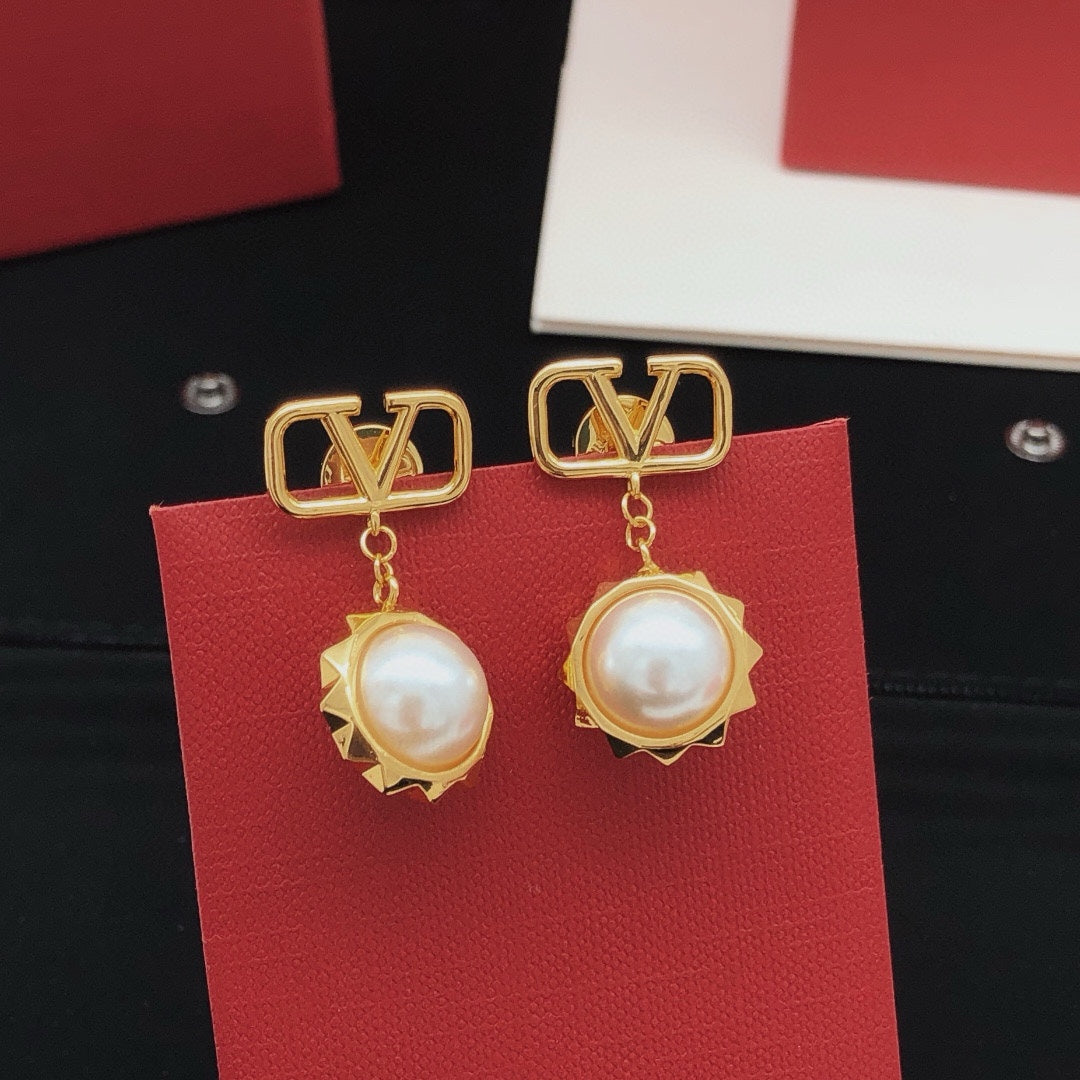 Martin Graham stud earrings in polished metal-tone – main product view