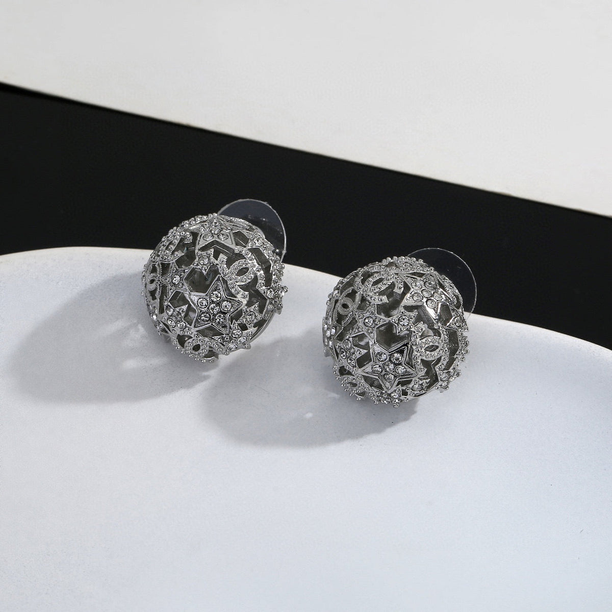 Martin Graham stud earrings in polished metal-tone – main product view