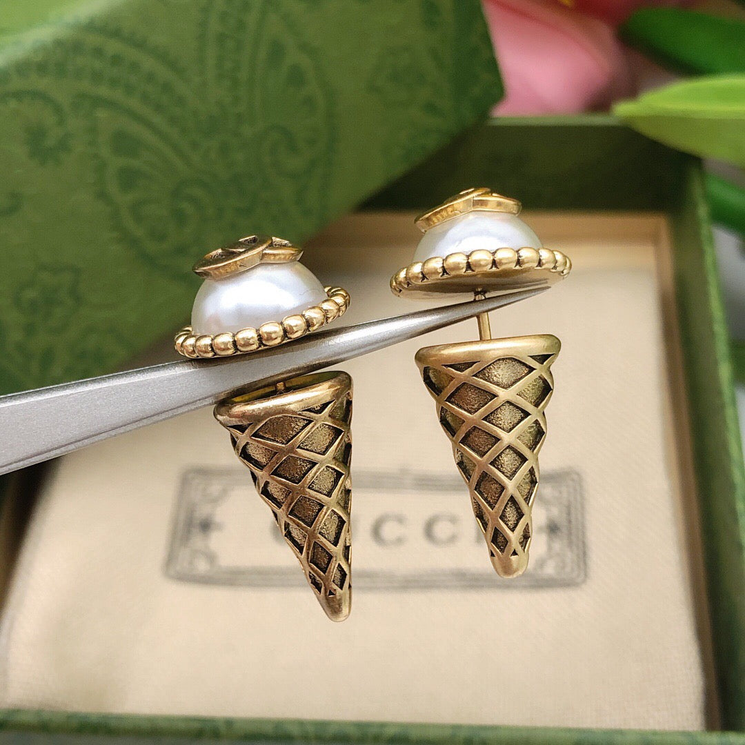 Martin Graham stud earrings in polished metal-tone – main product view
