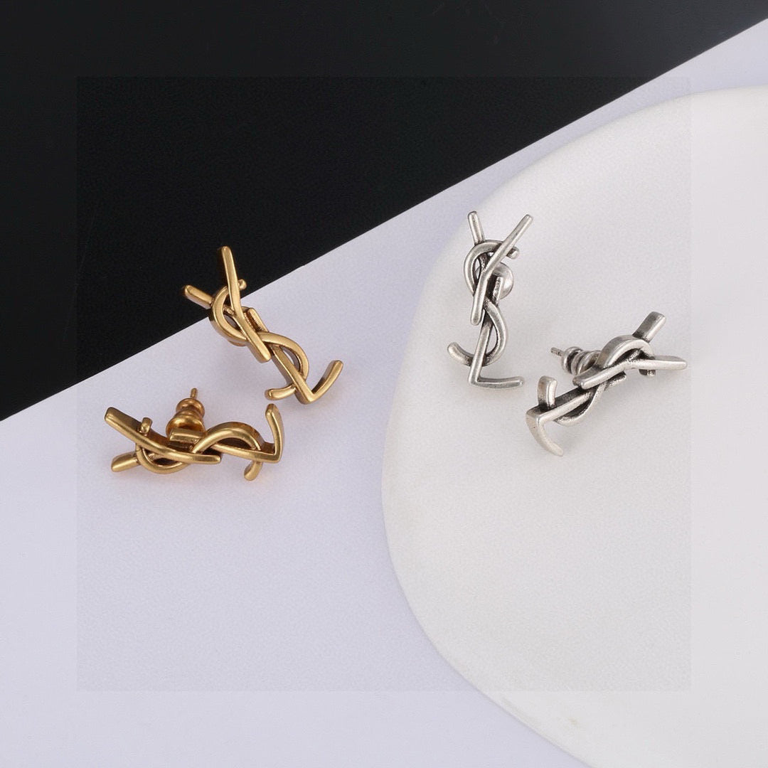 Martin Graham stud earrings in polished metal-tone – main product view