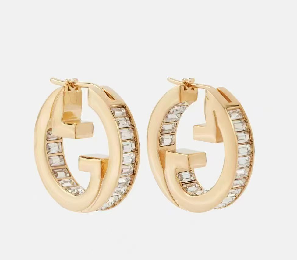 Martin Graham stud earrings in polished metal-tone – main product view