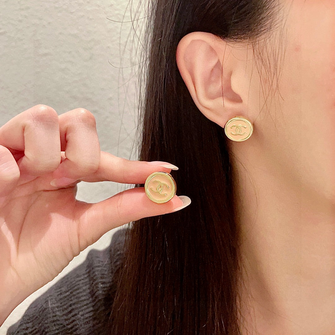 Martin Graham stud earrings in polished metal-tone – main product view