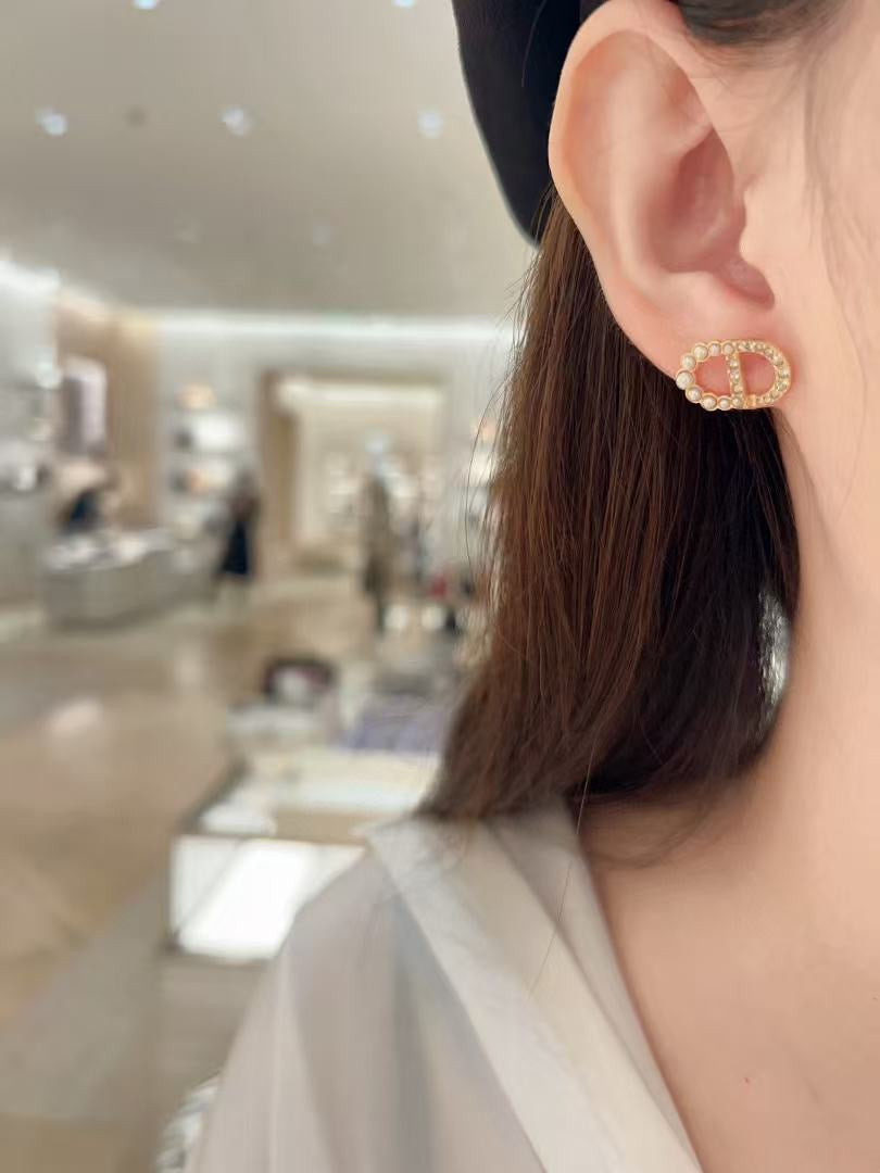Martin Graham stud earrings in polished metal-tone – main product view