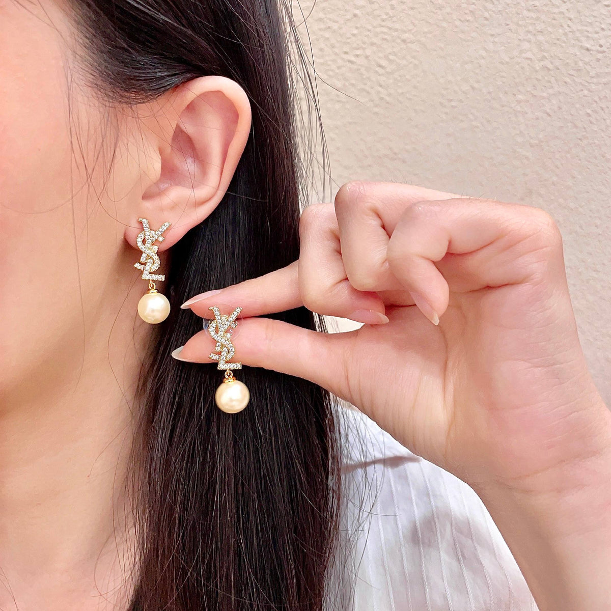 Martin Graham stud earrings in polished metal-tone – main product view