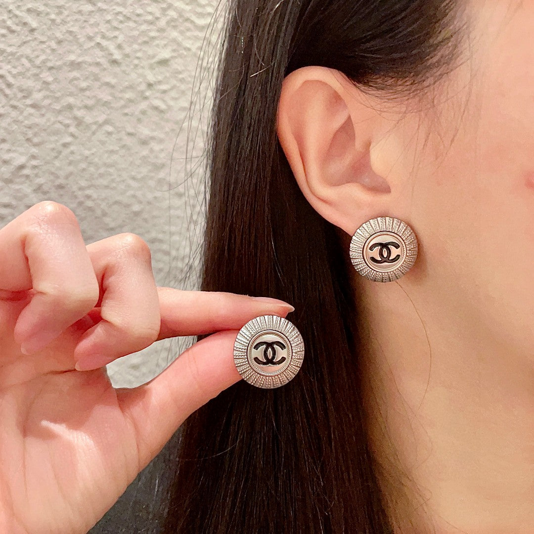Martin Graham stud earrings in polished metal-tone – main product view