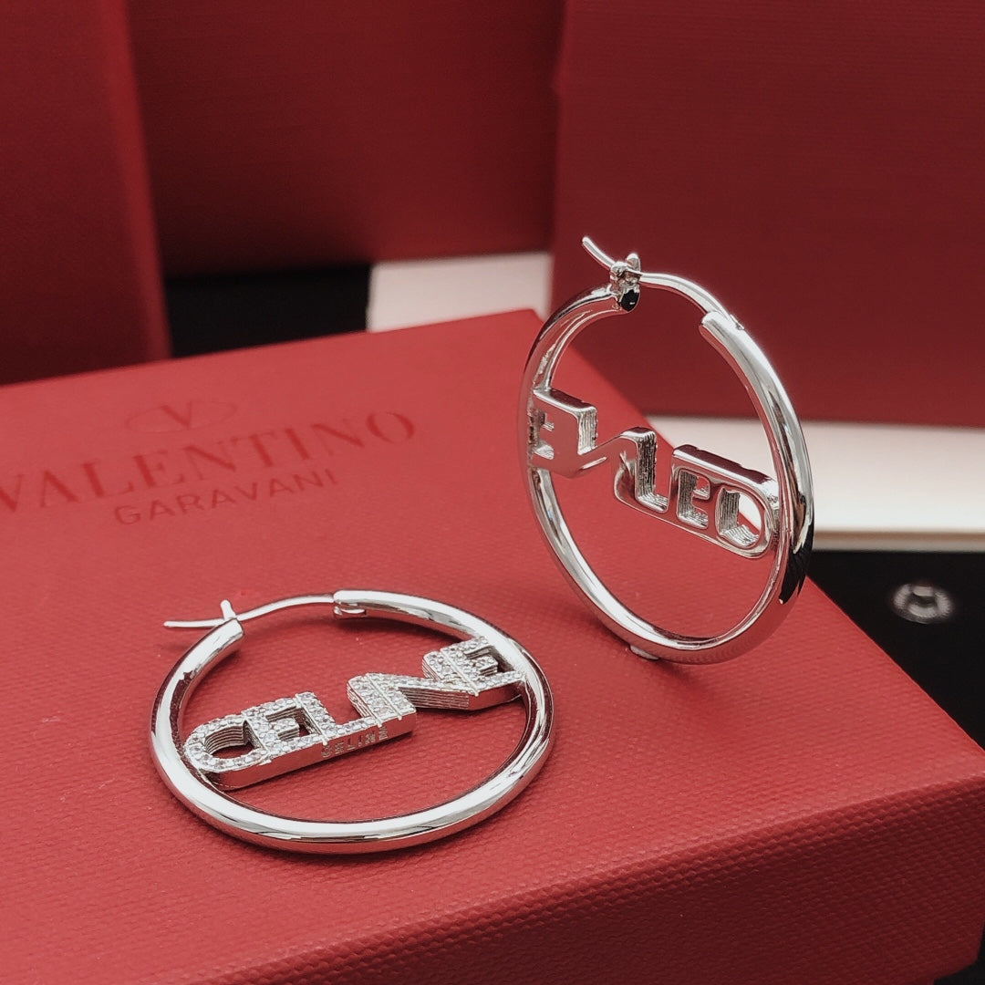 Martin Graham drop earrings in polished metal-tone – main product view