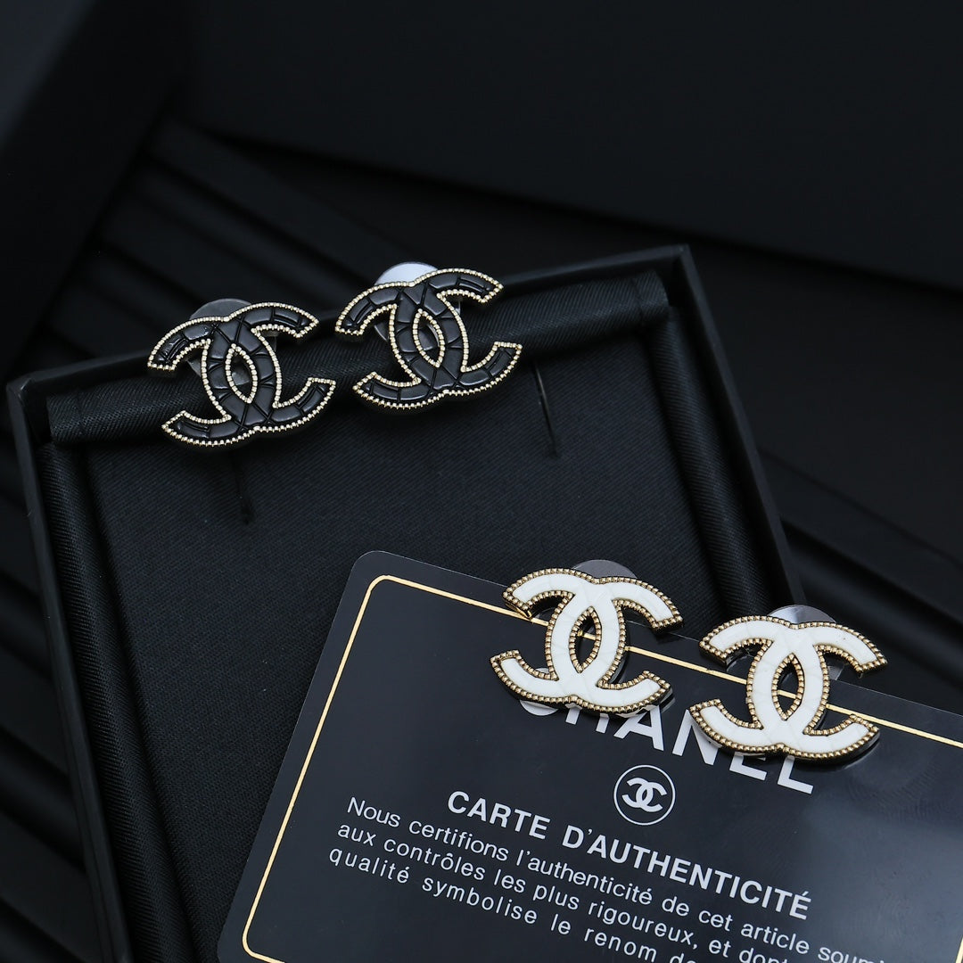 Martin Graham stud earrings in polished metal-tone – main product view