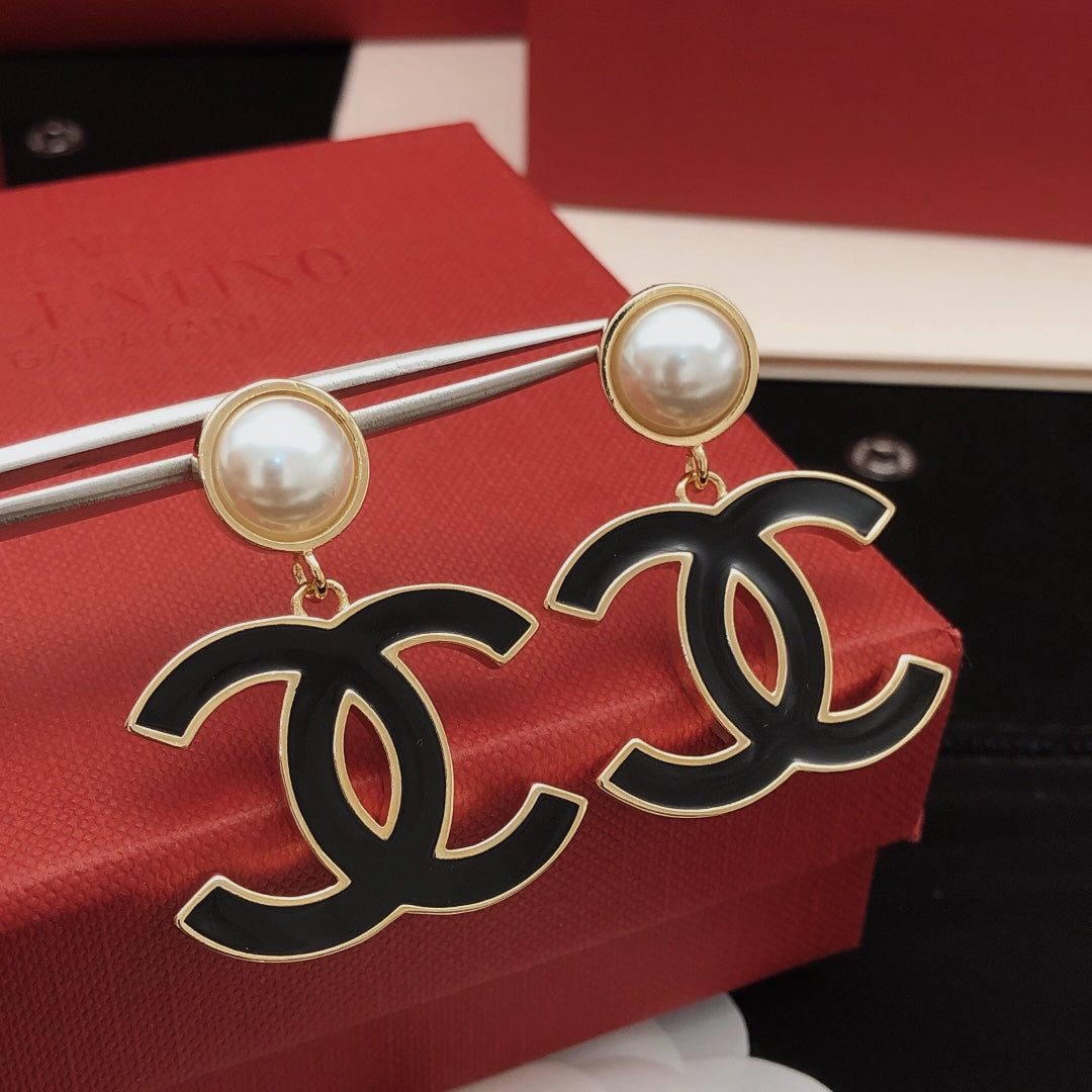 Martin Graham stud earrings in polished metal-tone – main product view