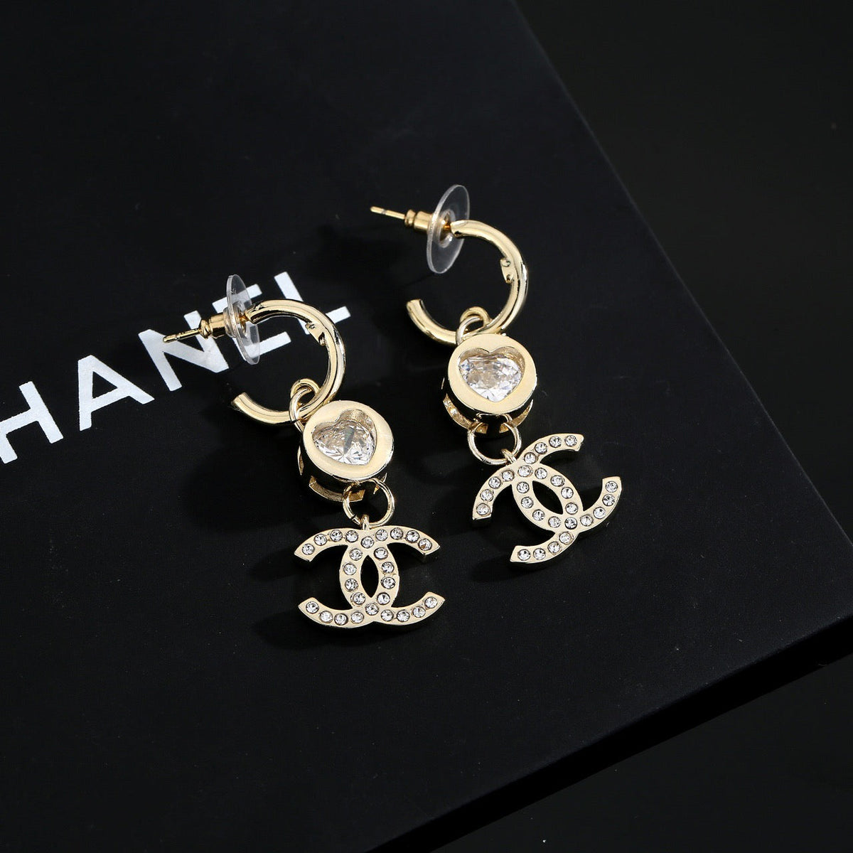 Martin Graham stud earrings in polished metal-tone – main product view
