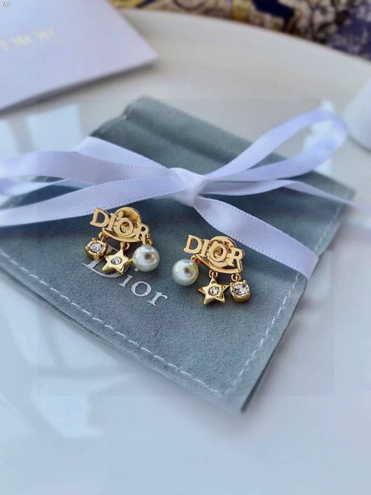 Martin Graham earrings in polished metal-tone – main product view