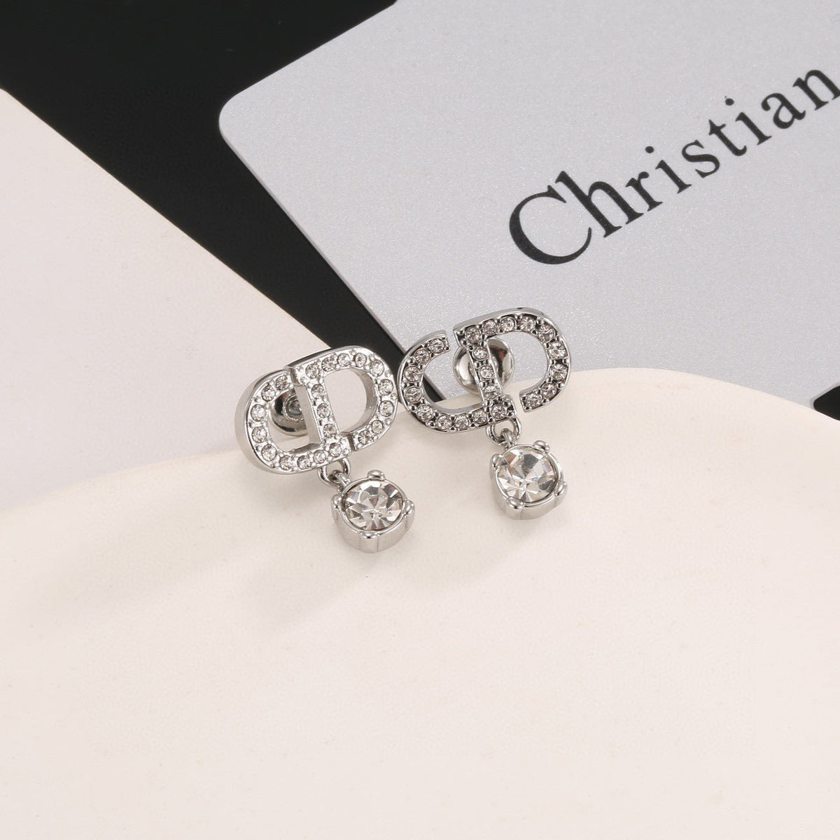Martin Graham stud earrings in polished metal-tone – main product view