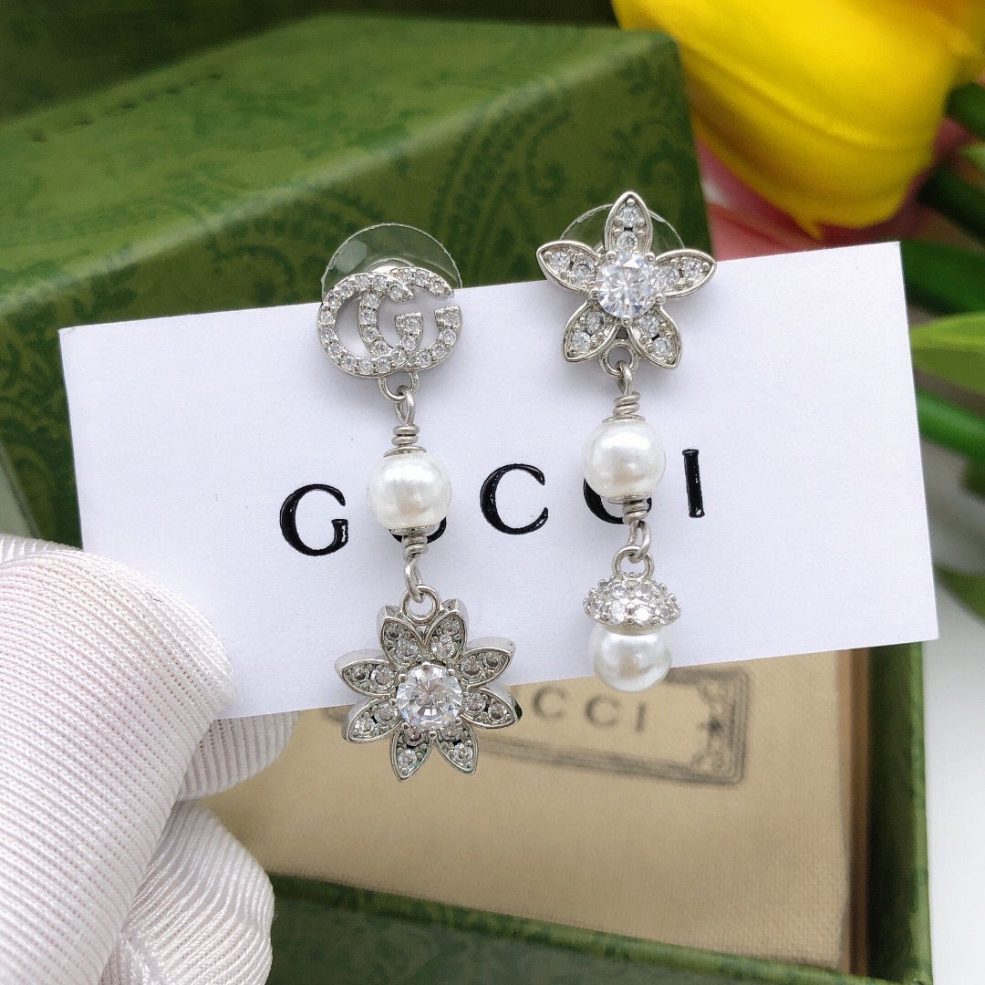 Martin Graham stud earrings in polished metal-tone – main product view