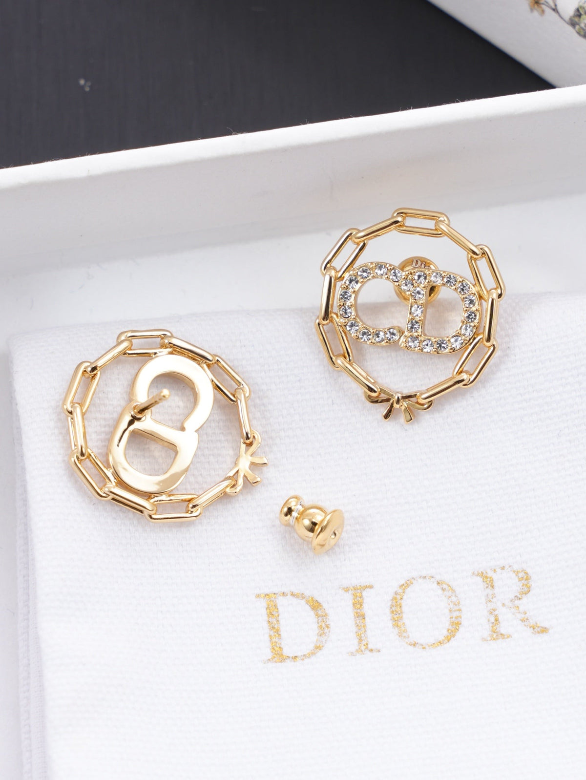 Martin Graham stud earrings in polished metal-tone – main product view