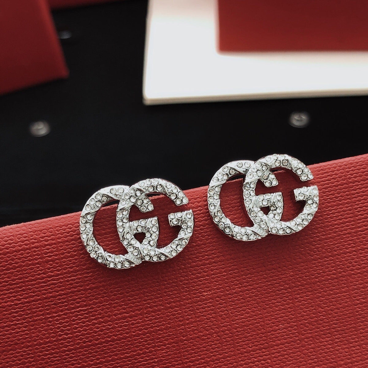Martin Graham stud earrings in polished metal-tone – main product view