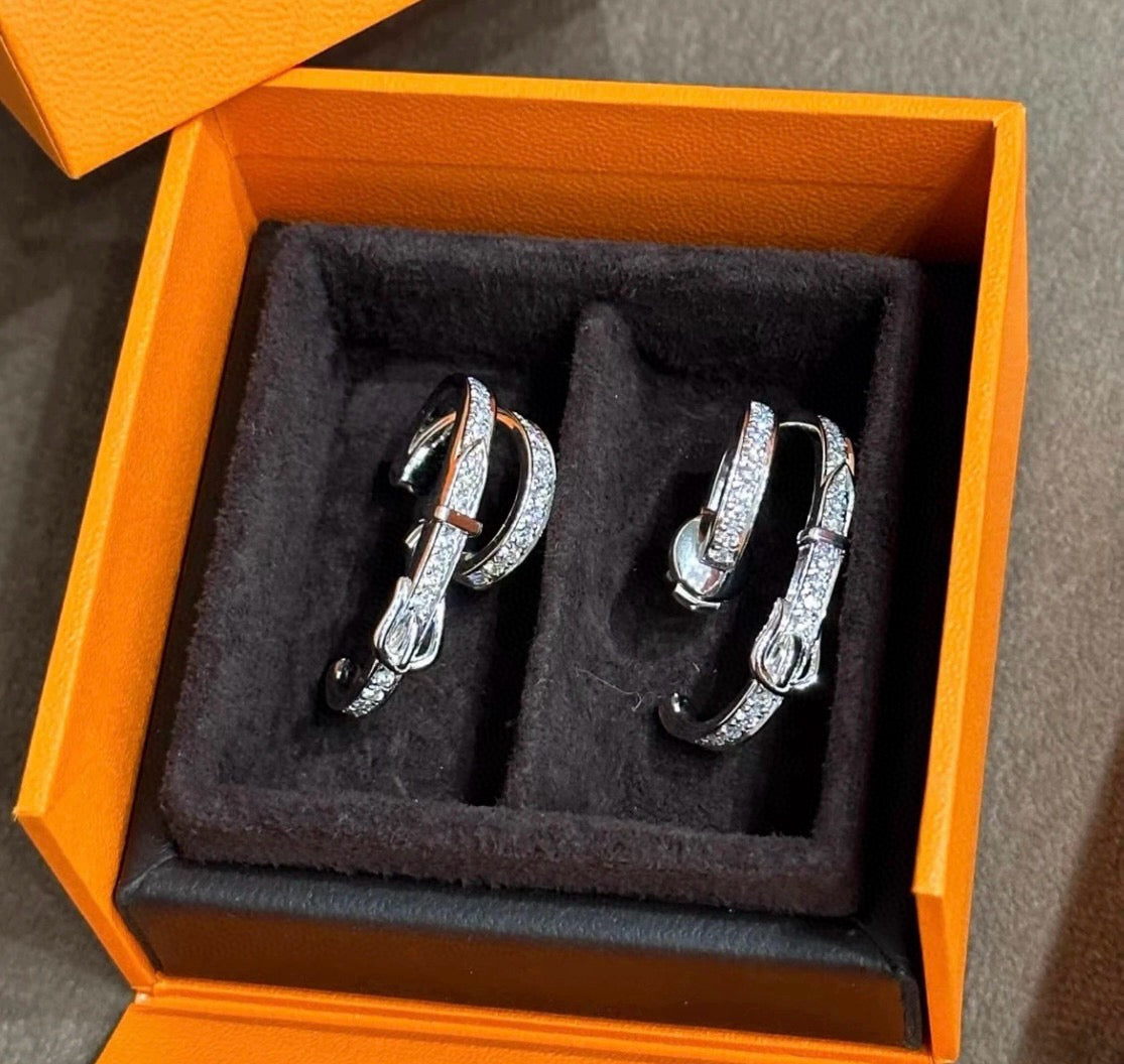 Martin Graham stud earrings in polished metal-tone – main product view