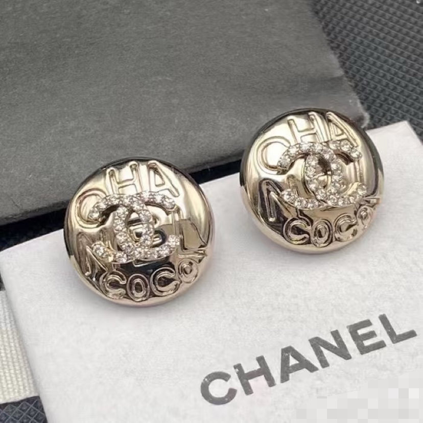 Martin Graham stud earrings in polished metal-tone – main product view