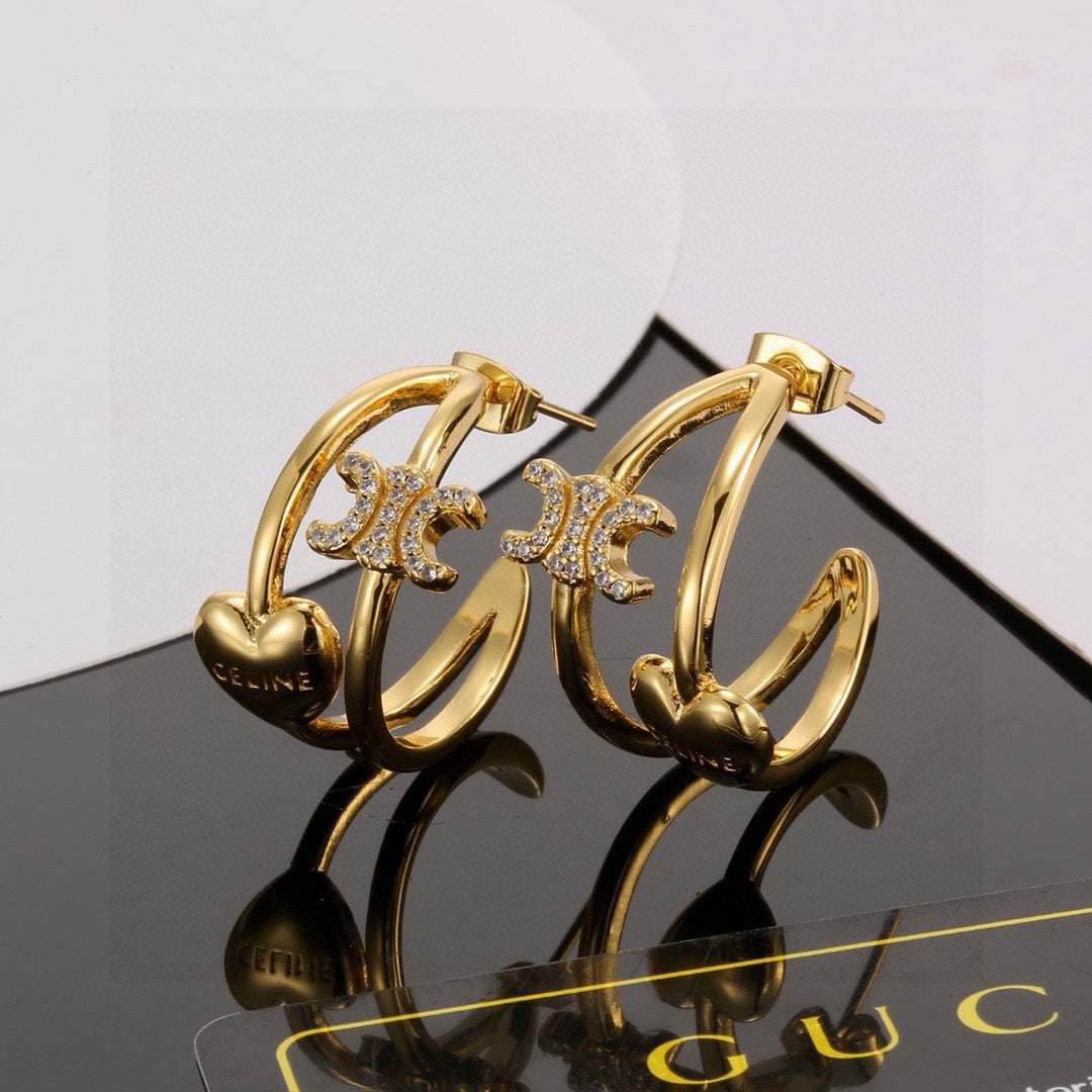 Martin Graham stud earrings in polished metal-tone – main product view