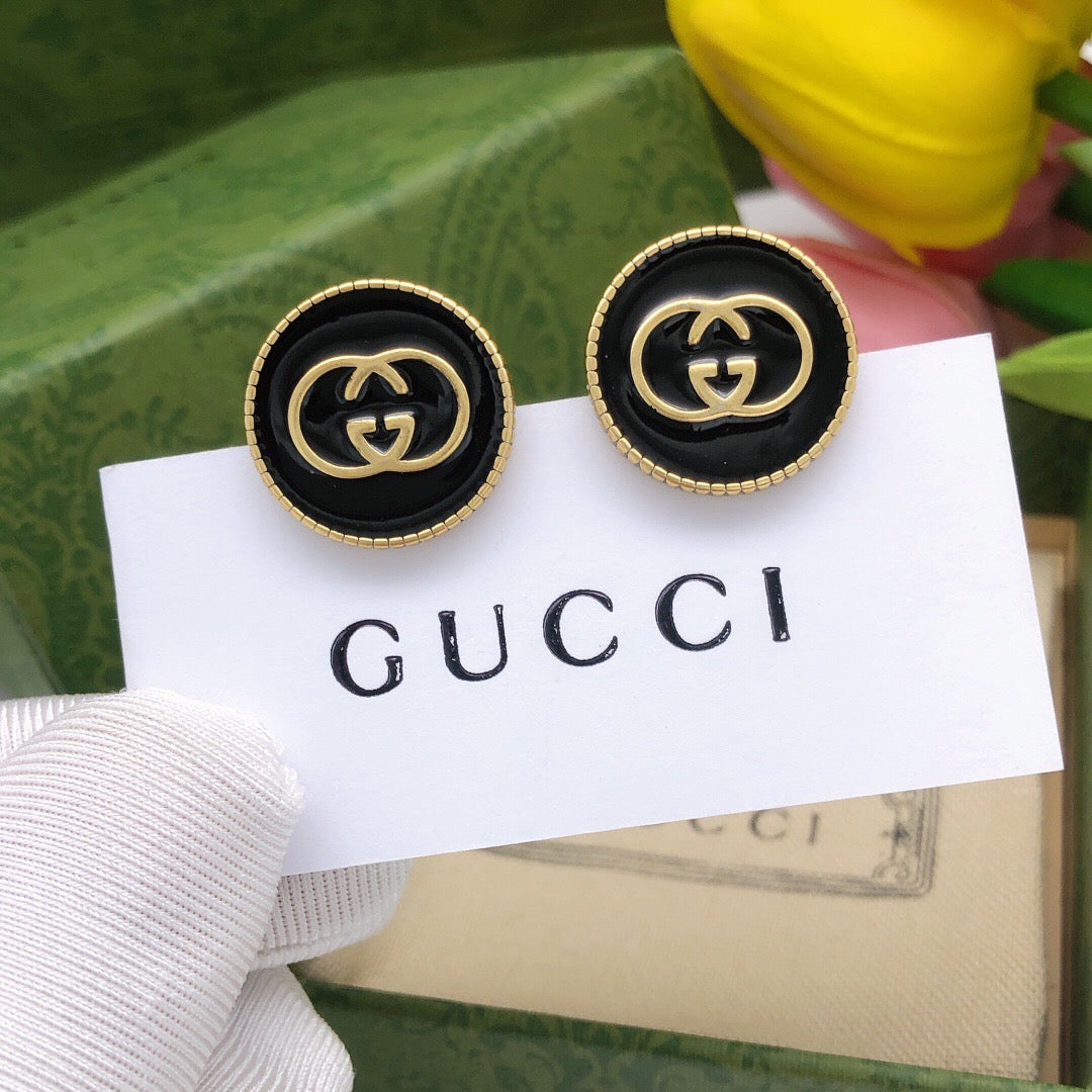 Martin Graham stud earrings in polished metal-tone – main product view