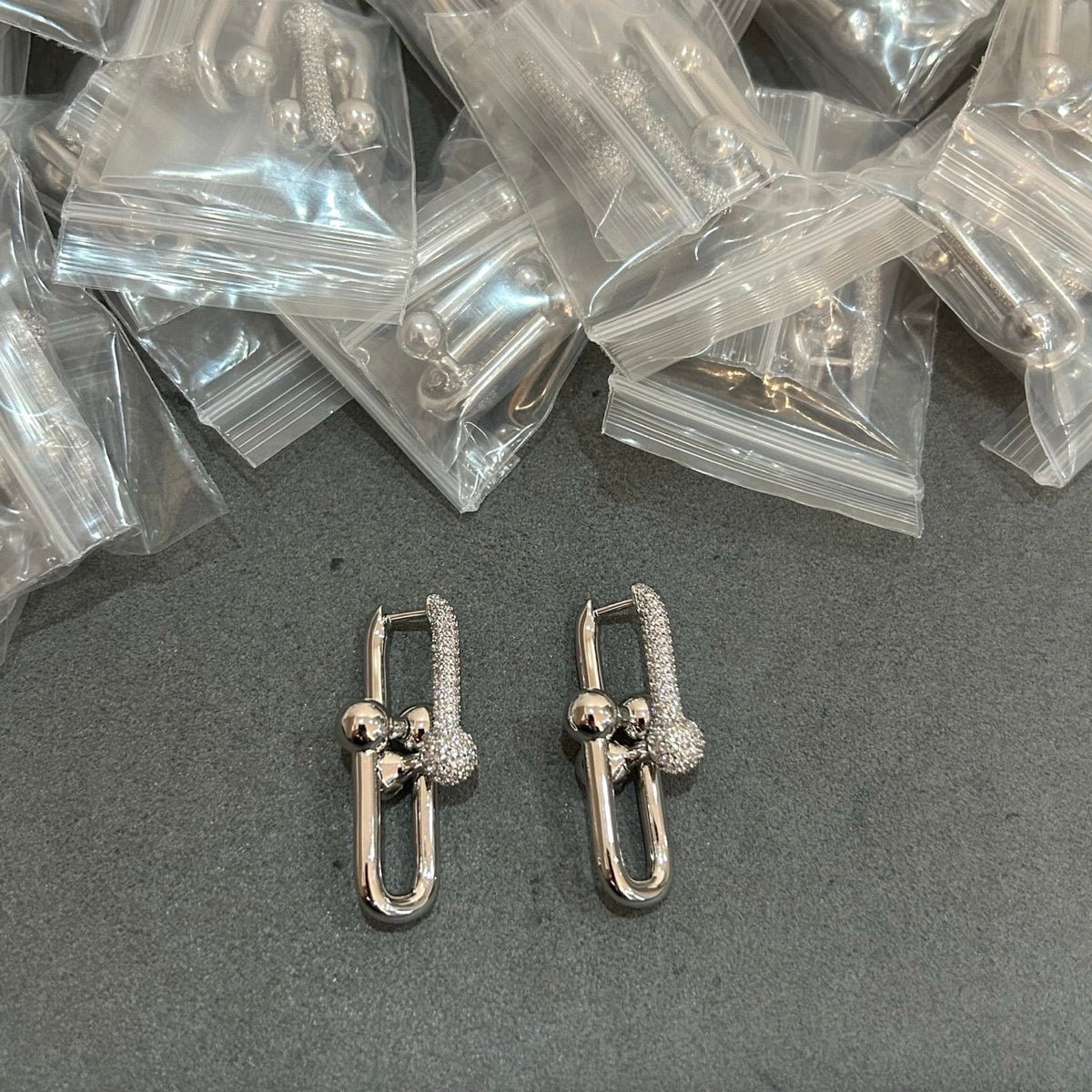 Martin Graham earrings in polished metal-tone – main product view