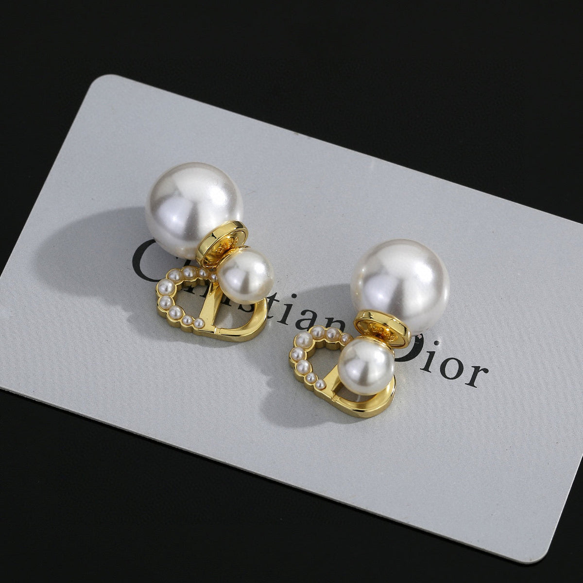 Martin Graham stud earrings in polished metal-tone – main product view