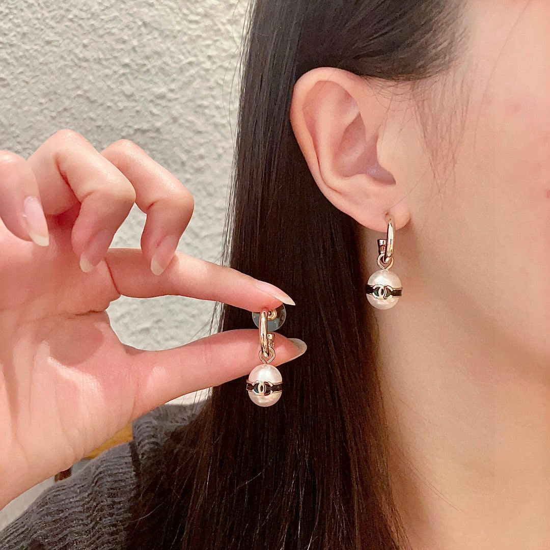 Martin Graham earrings in polished metal-tone – main product view
