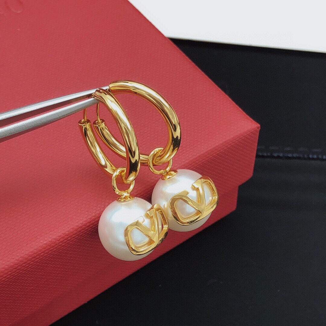 Martin Graham drop earrings in polished metal-tone – main product view