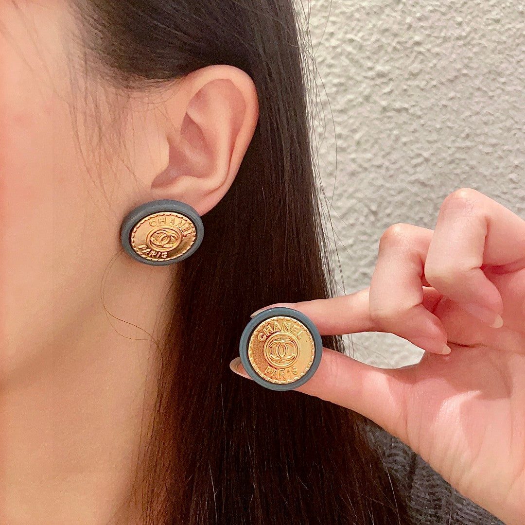 Martin Graham stud earrings in polished metal-tone – main product view