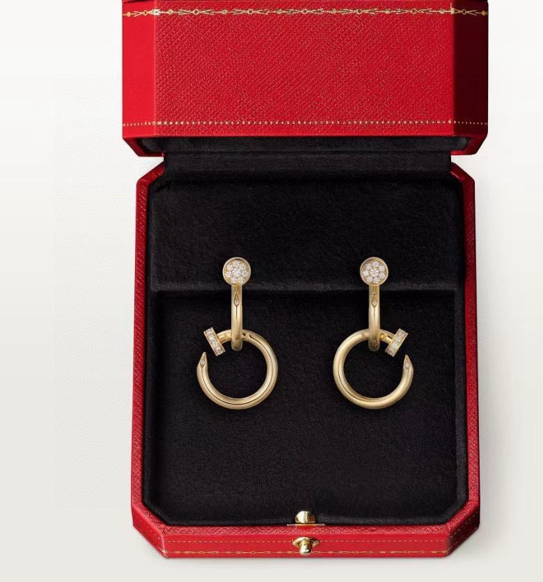 Martin Graham stud earrings in polished metal-tone – front view